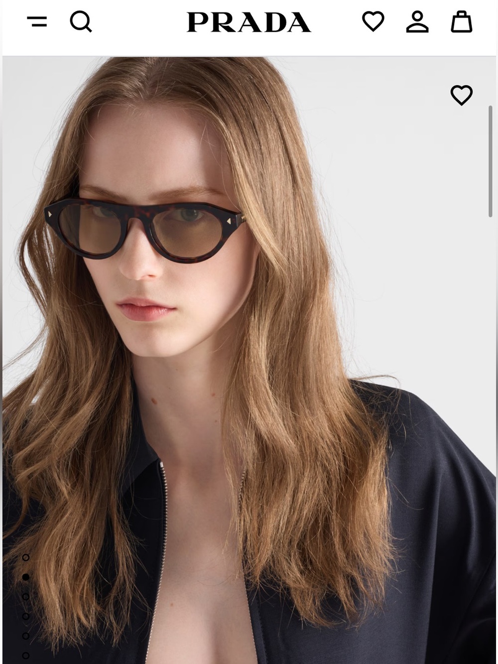 Prada sunglasses with the iconic metal plaque